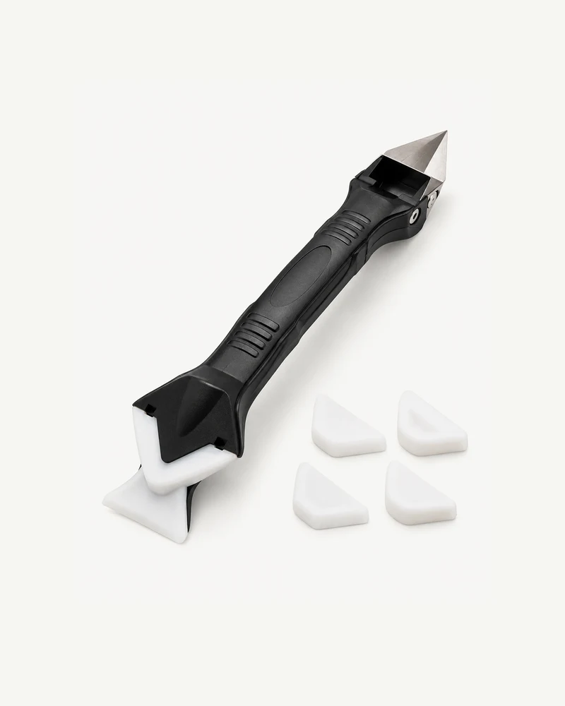 Caulk removal and finishing tool