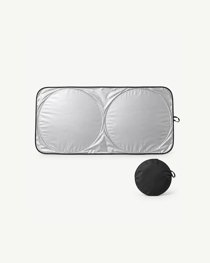 Folding windshield sun shade