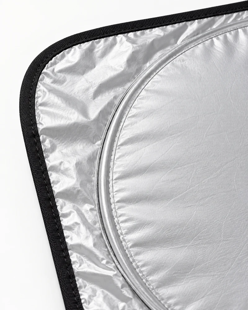 Folding windshield sun shade